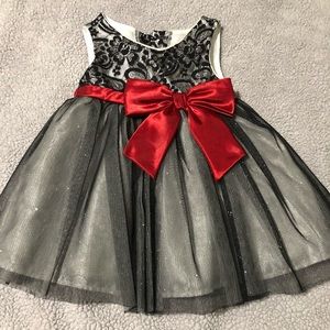 Toddler girl’s black and silver party dress